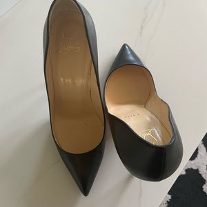 Christian Loubouttin black heels with red bottom.  Rarely worn.  Size 39.